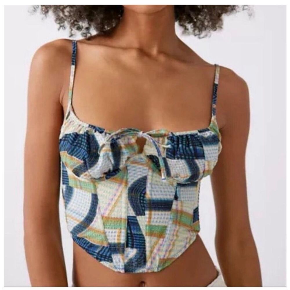 Out From Under seersucker corset top from Urban Outfitters features a colorful p